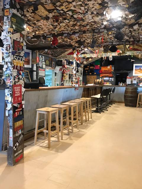 Outback bar interior covered with signed notes and memorabilia