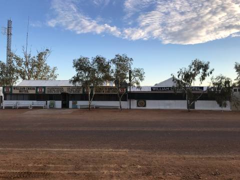 William Creek Hotel across a quiet red-dirt road