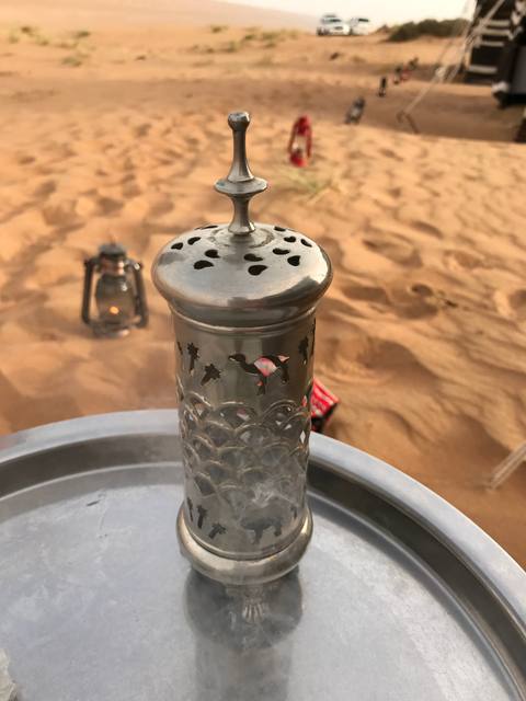 Ornate coffee pot on a tray at a Wahiba Sands camp