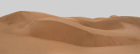 Panoramic view of softly layered Wahiba dune ridges
